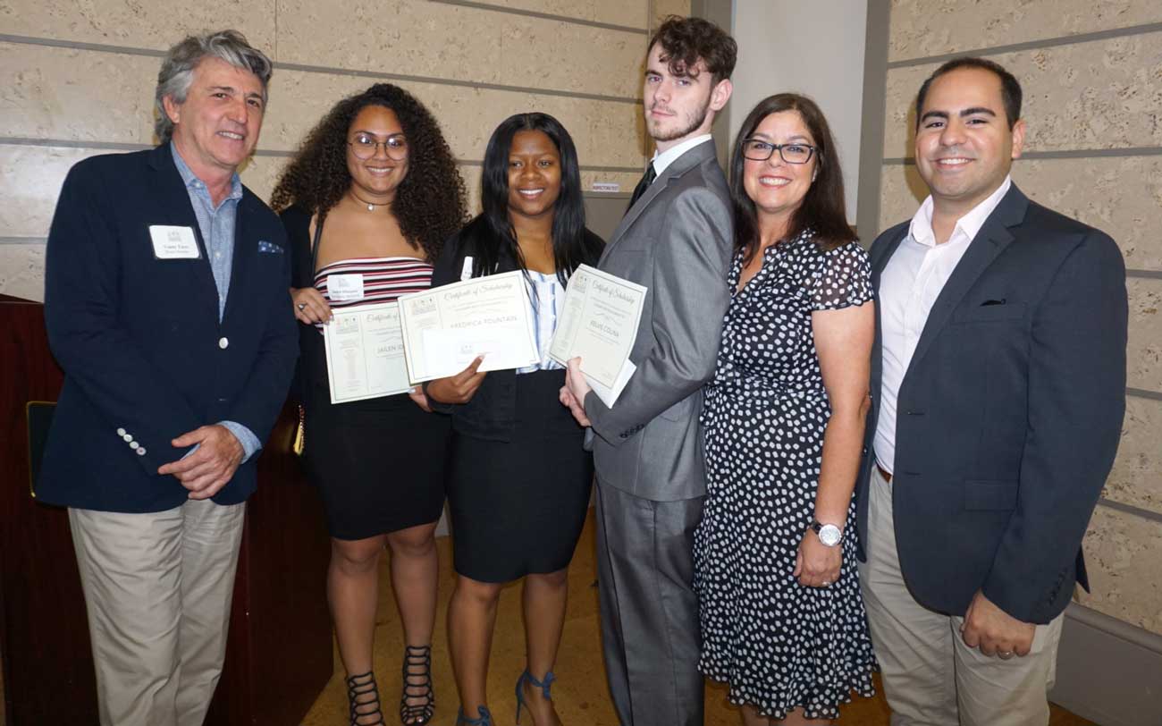 Community Foundation board member Venny Torre with students Jailen Idiaquez, Fredrica Fountain and Kelvis Colina, and instructors Mercy Vera and Michael Flores Interiano 
