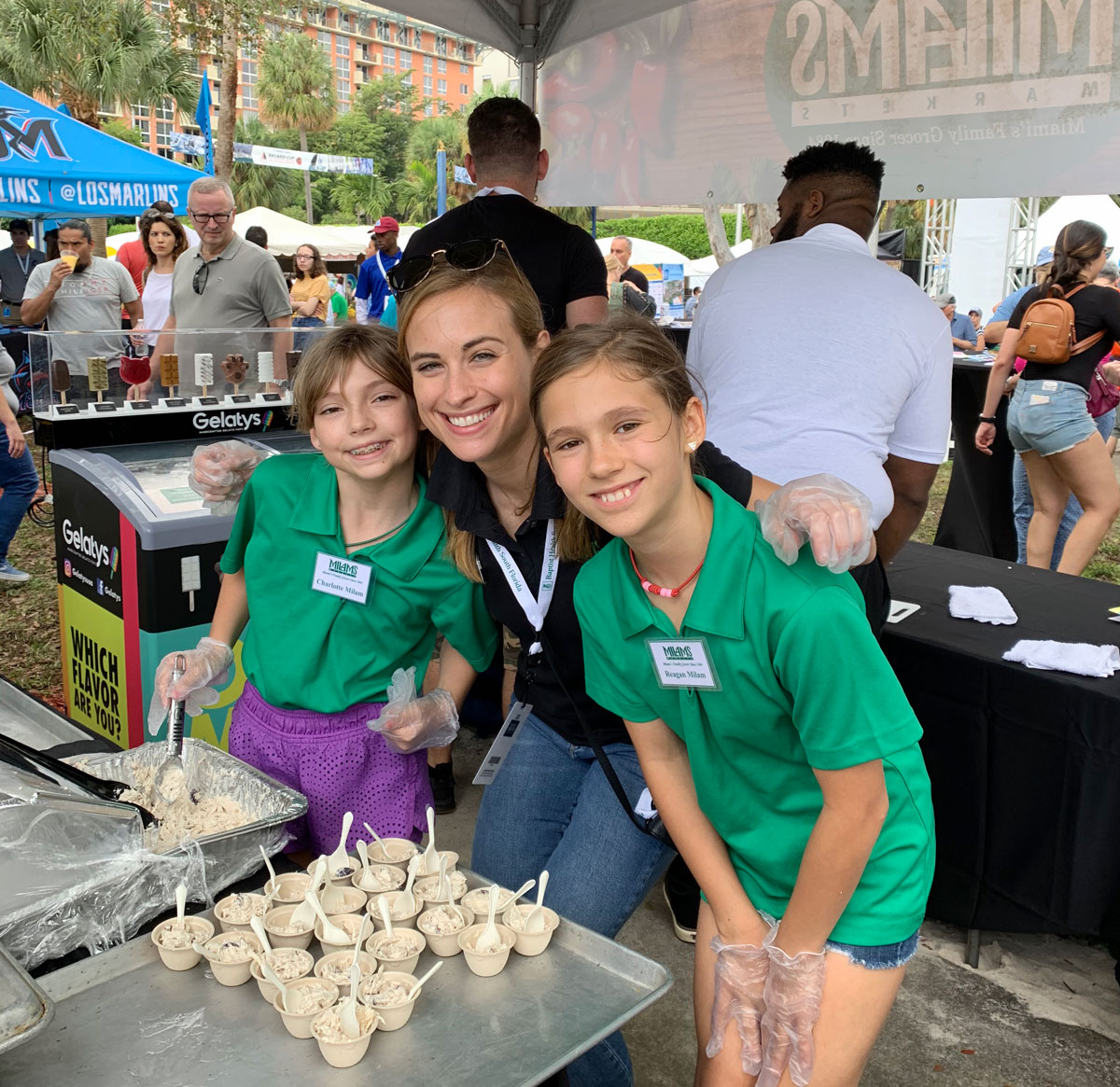 All in the family: Kristie Milam and helpers at their Coconut Grove Arts Festival booth