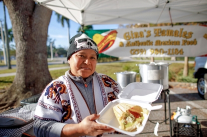 Gina Ortiz of Gina’s Tamales at the River District Farmers Market on Thursdays. 