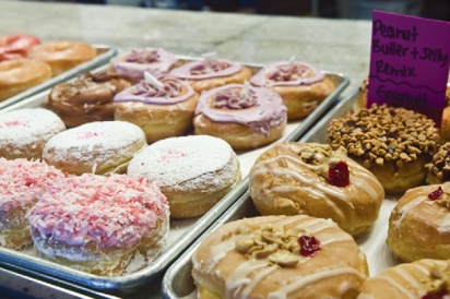 Various doughnuts including peanut butter and jelly.