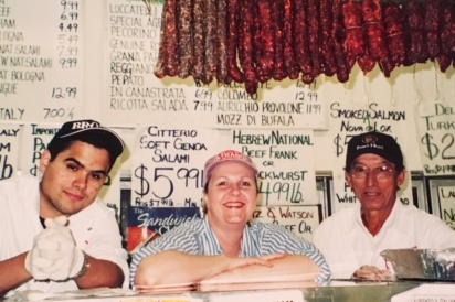 Jose, Mel and Rudy behind the deli counter 