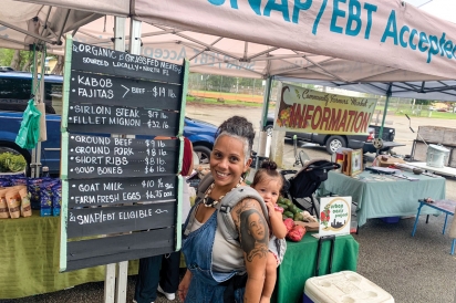 Yorkis Rodriguez Mojica with her daughter, Tara. EBT/SNAP are available at their booth at the Southwest Community Farmers Market. 