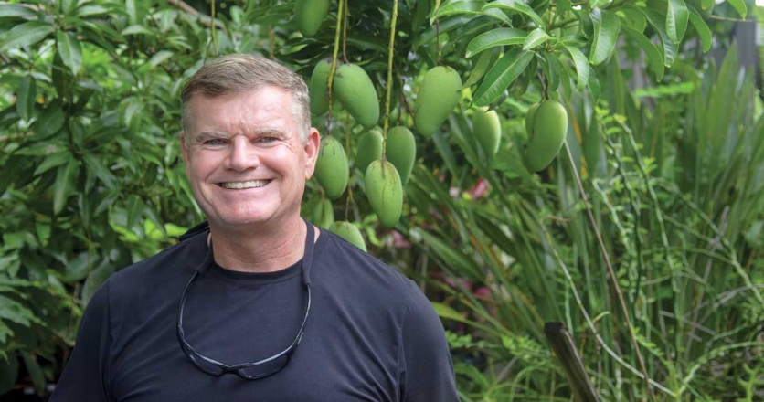David Harold and one of his 39 mango trees