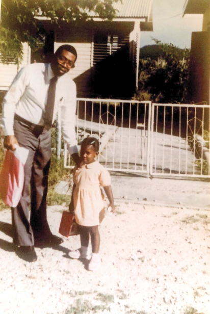 Collins with her father in Antigua, where she grew up eating the fruits and seafood of the island