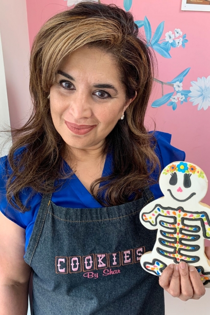 Shar and her cheerful Halloween skeleton cookie