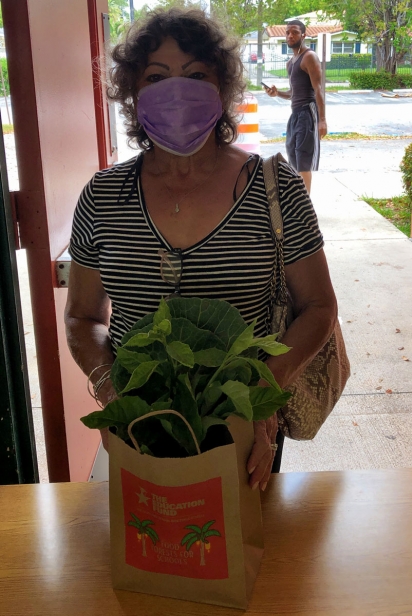 Recipient of produce bag at Maya Angelou Elementary School