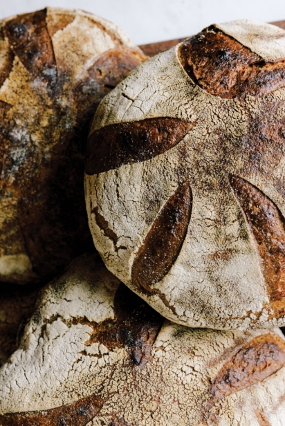 Rustic artisan loaves are baked in-house