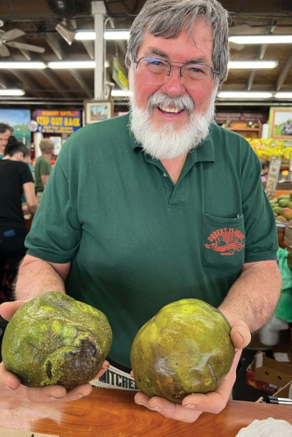 Robert Moehling with ripe black sapote at Robert Is Here