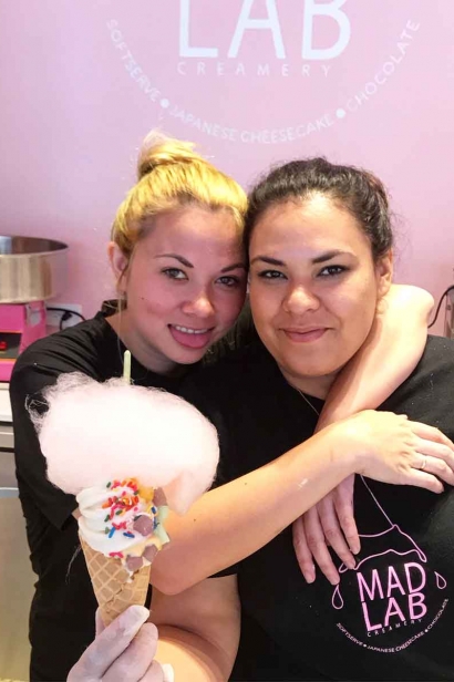 Soraya Kilgore, right, with ice cream cone topped with cotton candy