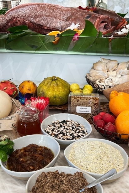 Assortment of seafood and foods, including an ostrich egg, ugli fruit, dragonfruit and mamey sapote from Robert Is Here 