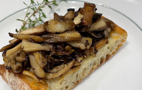 Bruschetta topped with mushrooms
