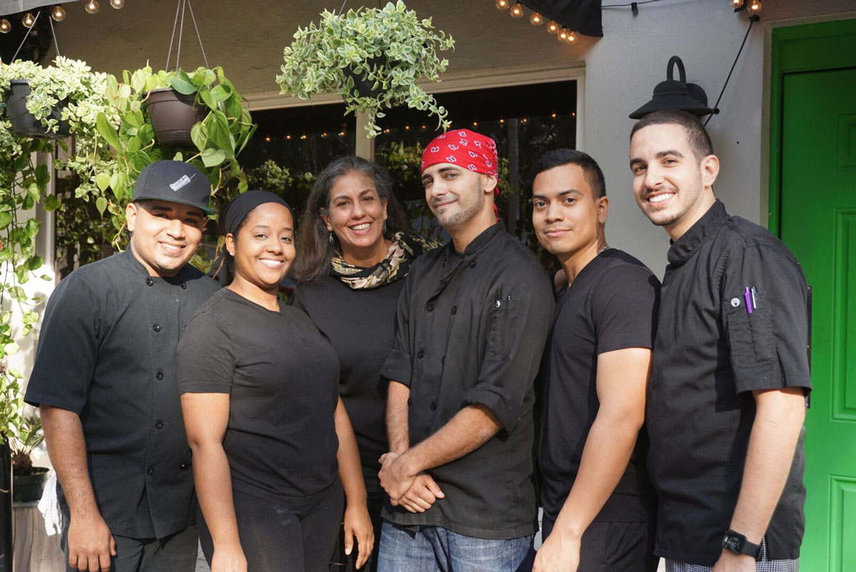 Rabel (center, rear) and staff of Green Gables Cafe