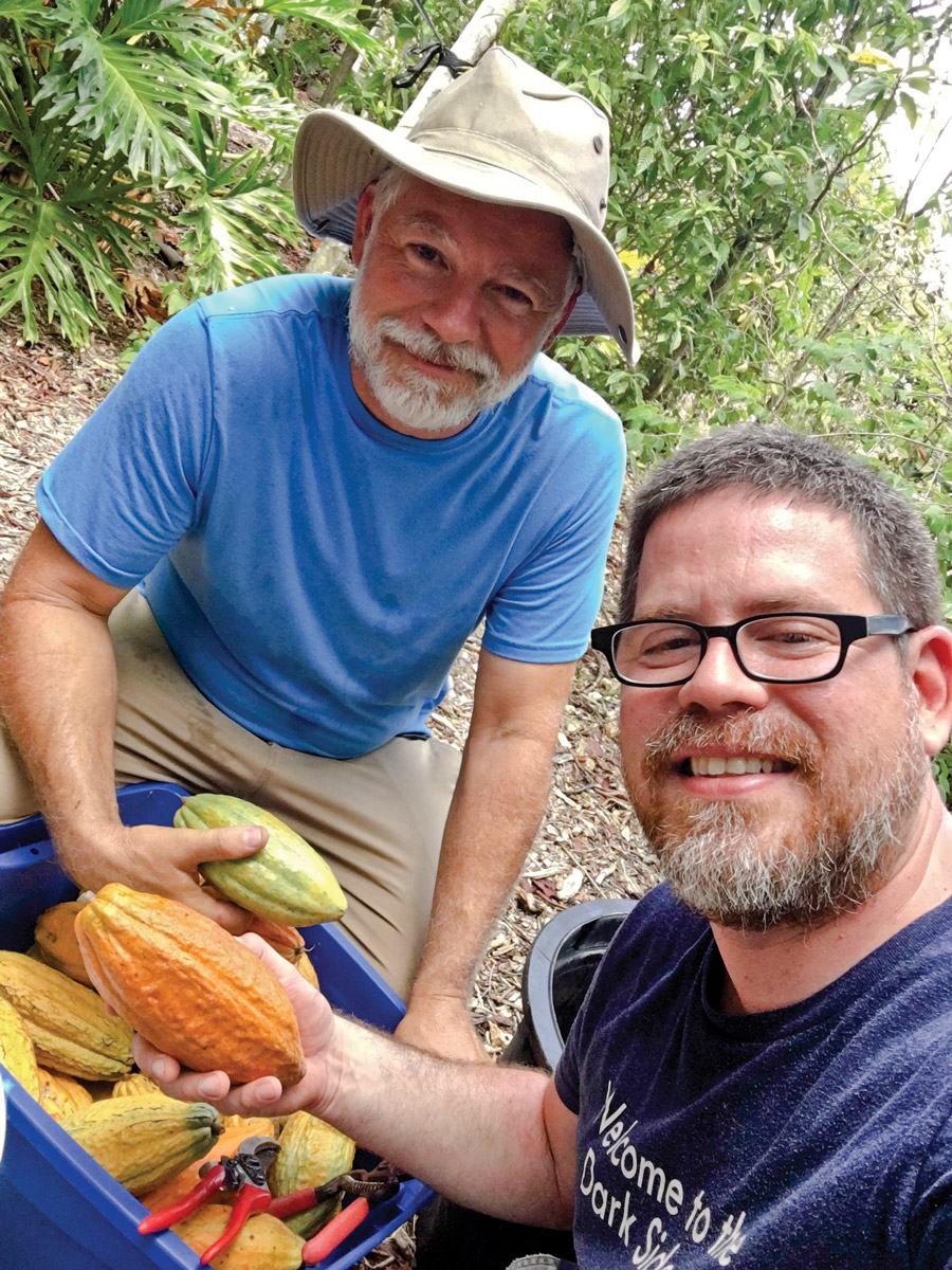 Fred Hubbard (left) and Ricardo Trillos with cacao harvest