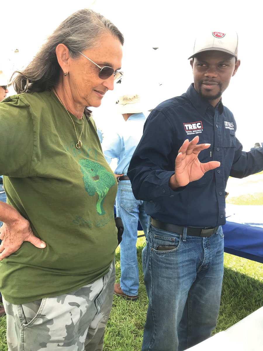 Bee Heaven Farm’s Margie Pikarsky, who grows Jamaican pumpkin and a Puerto Rican calabaza on her farm, talks with Geoffrey Meru of TREC.
