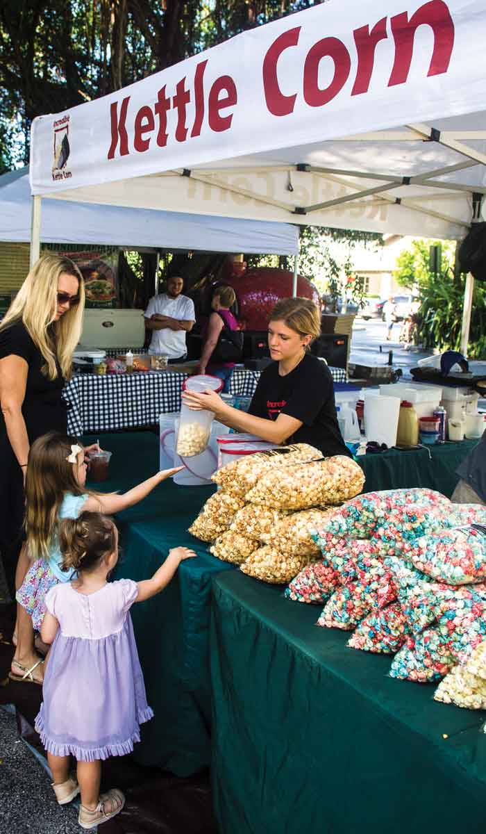 Leilani offering samples at Pinecrest Gardens Farmers Market