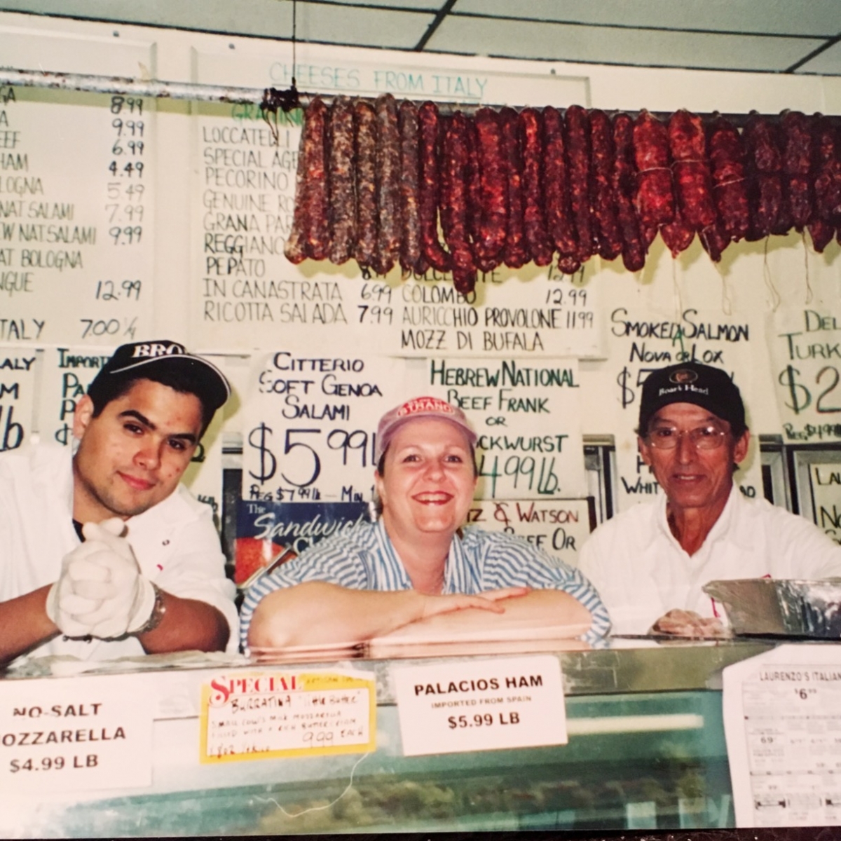 Jose, Mel and Rudy behind the deli counter 