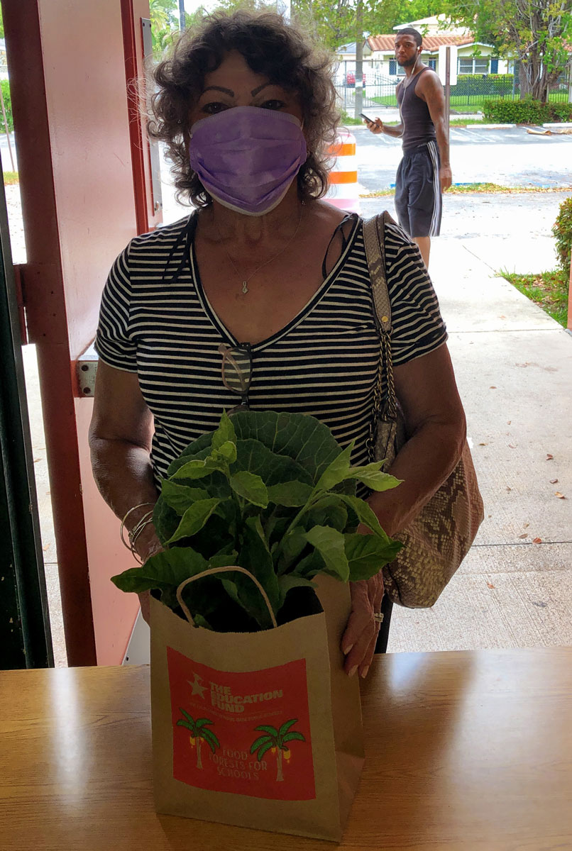 Recipient of produce bag at Maya Angelou Elementary School