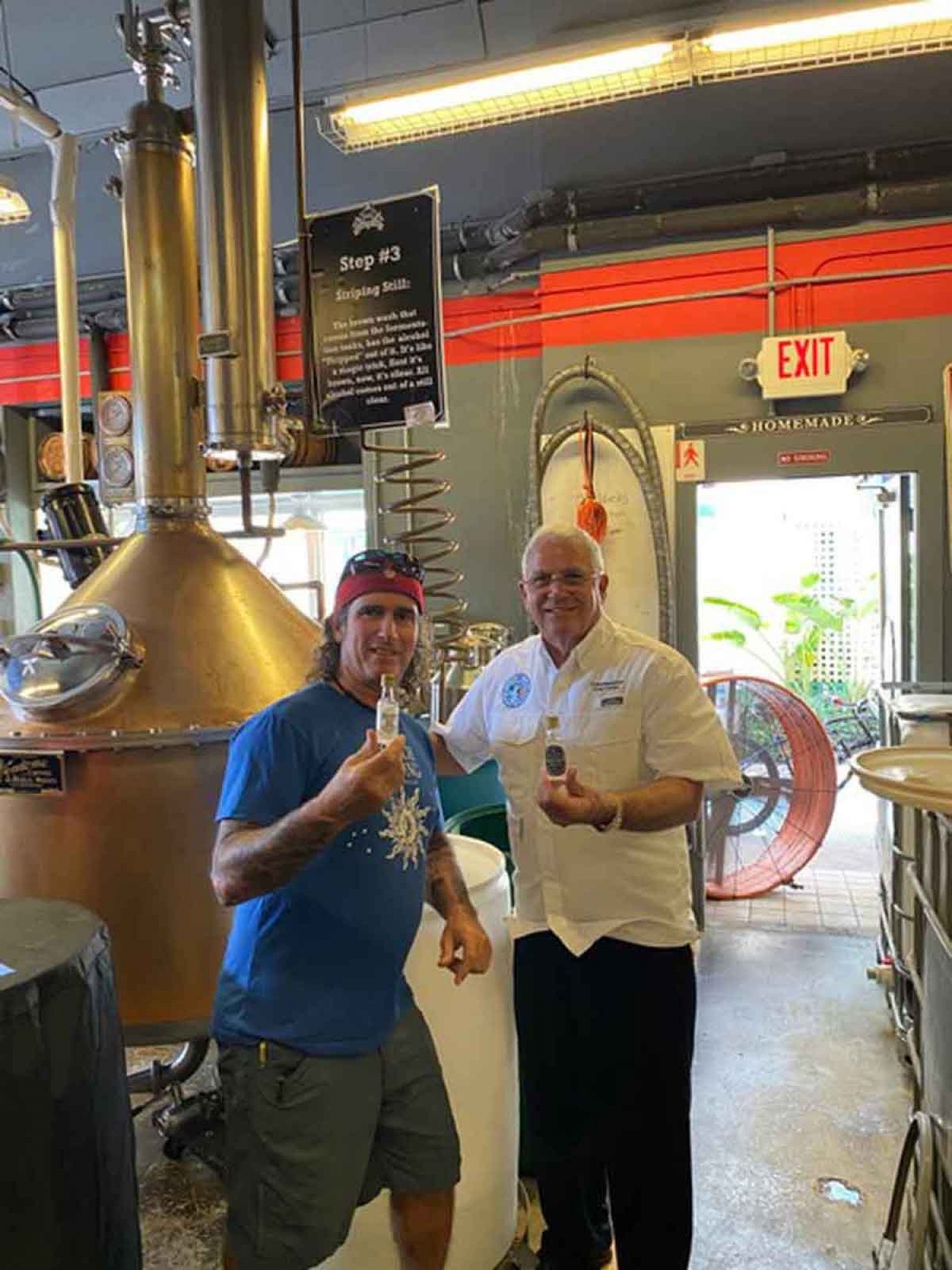 Menta with commissioner Craig Cates