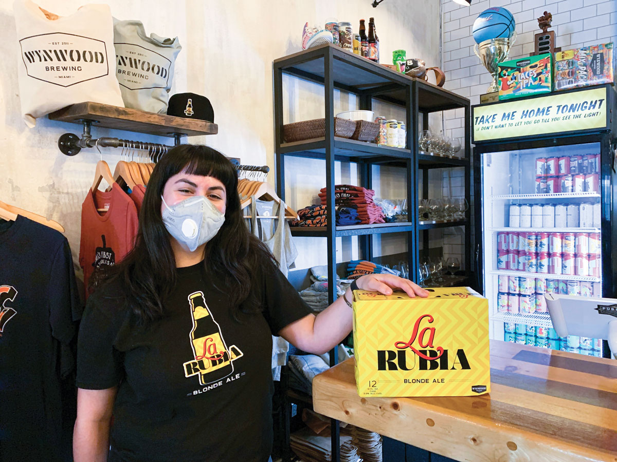 Ready for curbside pickup? Nancy Lopetegui, Wynwood Brewing Company’s Taproom general manager, is here to help.