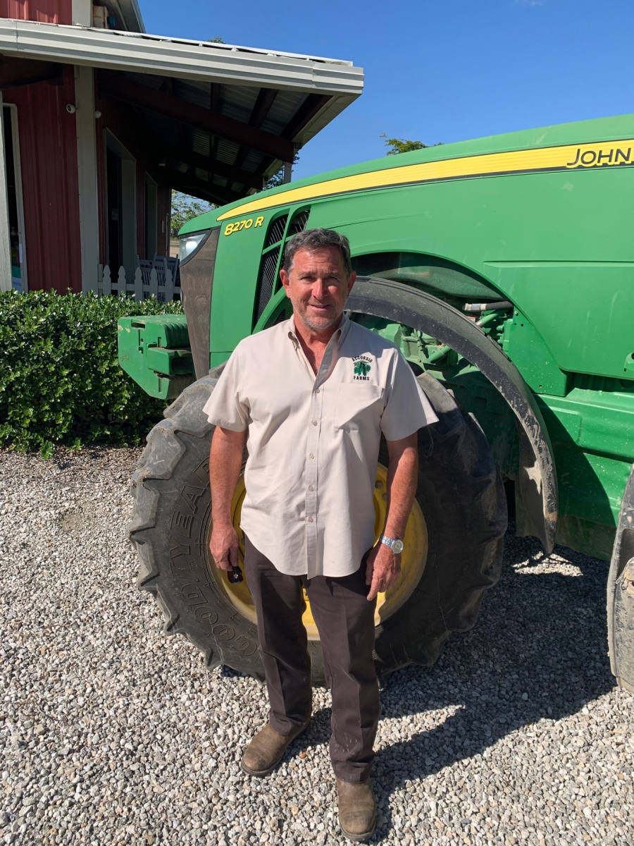 Sam Accursio in front of his farmstand on Krome Ave.