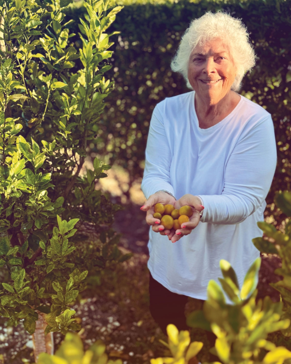Lois Marks and one of her calamondin trees
