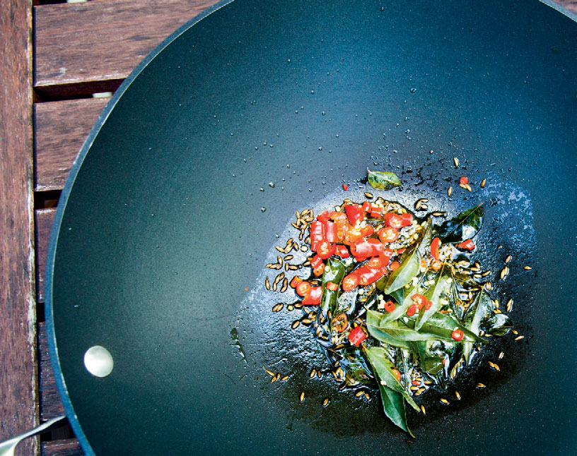 Whole spices, peppers, and curry leaves
